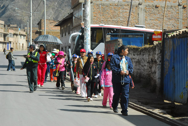 A small religious procession, Huancavelica