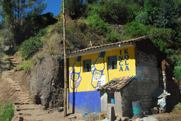 Inca Kola advertising on a house