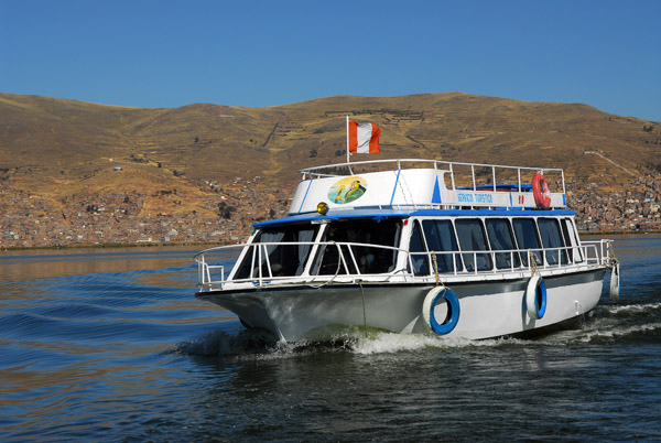 Another tour boat heading for the Floating Islands, Lake Titicaca