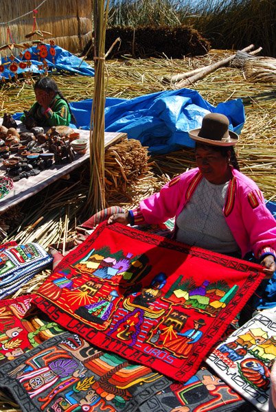 The Uros try and make money selling souvenirs