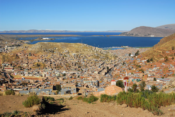 Nice view of Puno and Lake Titicaca with snow covered Bolivian peaks in the distance