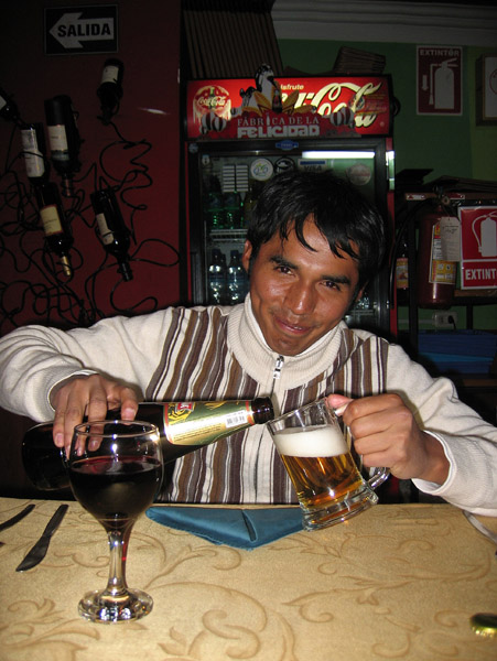 Marcos pouring a beer, Puno