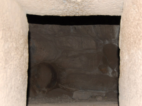 Peek through to the interior through an eastern-facing opening