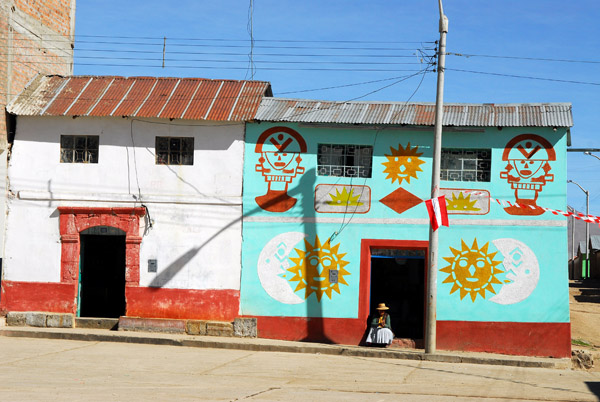 House painted with traditional sympols, Vilque