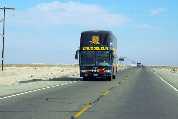Cruz del Sur bus on the Panamerican Highway headed to Lima