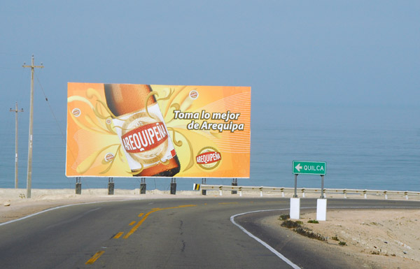 Arequipeña billboard as we reach the coast at Camaná