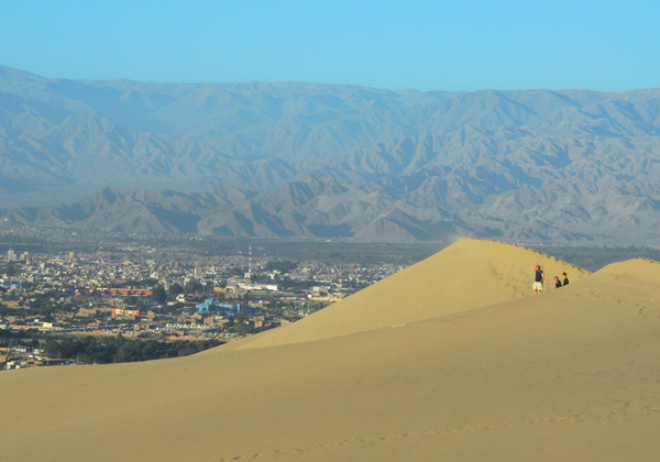 Dunes with the city of Ica in the distance