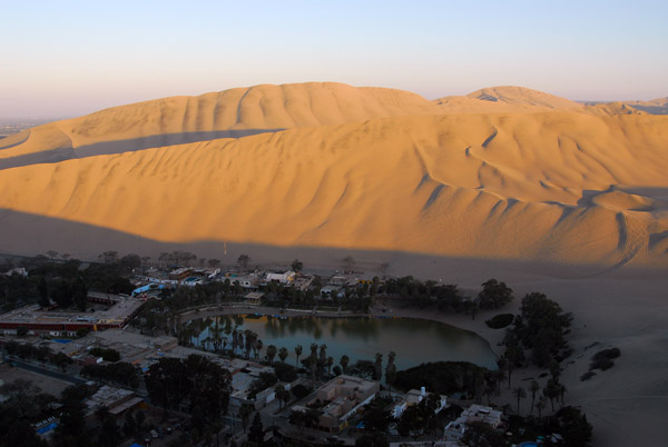 The oasis of Huacachina in shadow