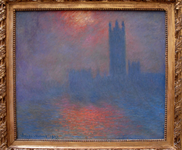Houses of Parliament with break of sunlight through the fog by Claude Monet, 1904