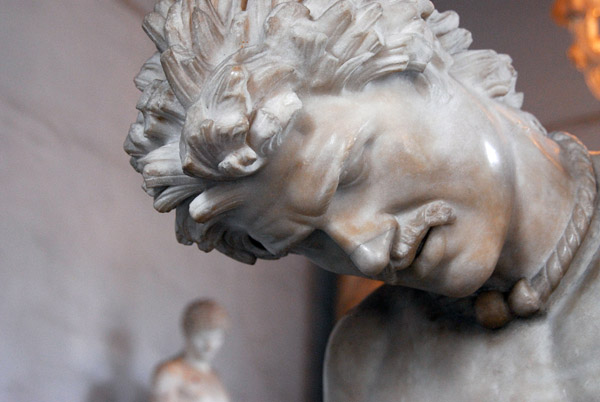 The incredibly realistic face of the Dying Gaul wearing a collar typical of the Celts