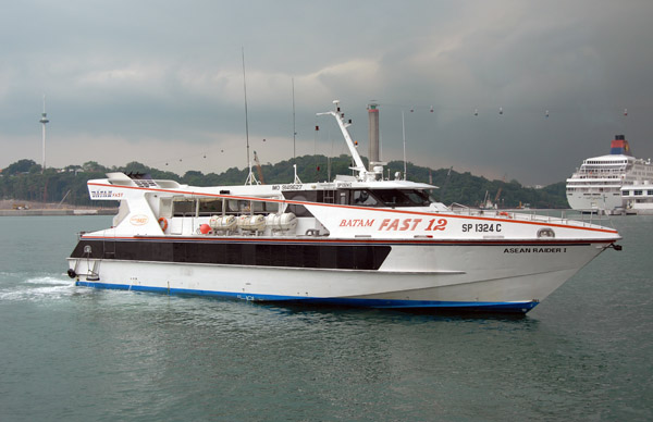Batam Fast Ferry Asean Raider I pulling in to dock at the base of the Sentosa Bridge