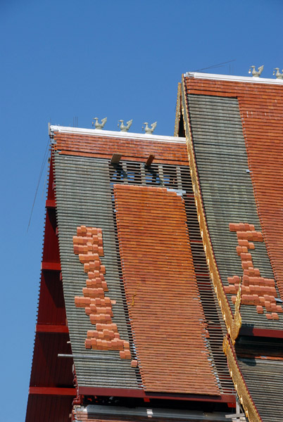 Reshingling a temple, Chiang Mai