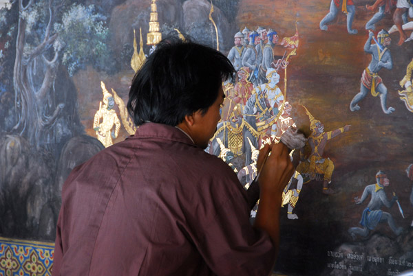 Mural restorer at work, Wat Phra Kaeo