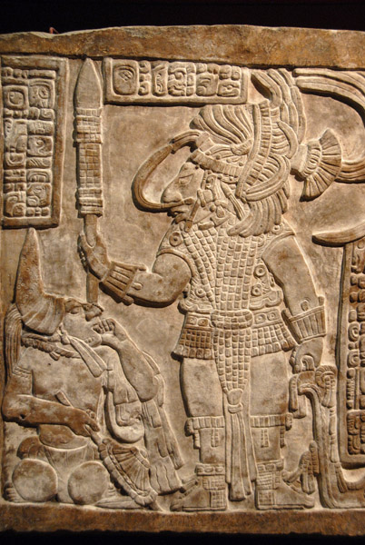 Lintel 16 depicting the ruler, Bird Jaguar, standing over a captive noble, Maya ca 770 AD