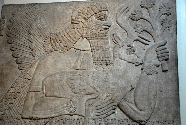 Protective spirit carrying a deer guarded one of the doors to the throne room, Nimrud (northwest palace) Assyrian, ca 860 BC