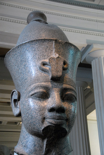 Red granite head of a colossal 18th Dynasty king, ca 1390, Thebes (Temple of Mut)