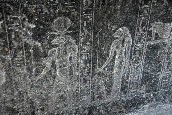 Part of the frieze of deities on the interior of the sarcophagus of Hapmen depicting Khnum, the ram-headed god, and Sakhmet