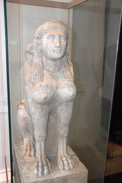 Limestone seated female sphinx, Roman Period, 2nd C. AD from Upper Egypt