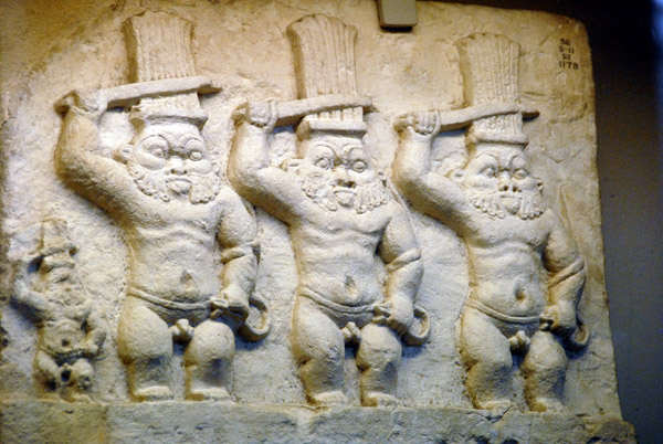 Figures of the god Bes each holding a knife to ward off evil, Ptolemaic Period (300-30 BC)
