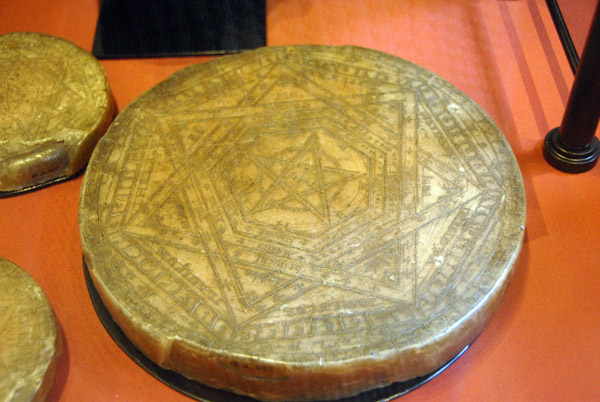 Disk carved with magical symbols associated with the Elizabethan magicial Dr. John Dee (1527-1608)