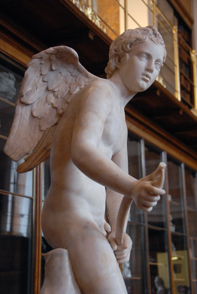 Restored 2nd C. AD Roman statue of Cupid stringing his bow