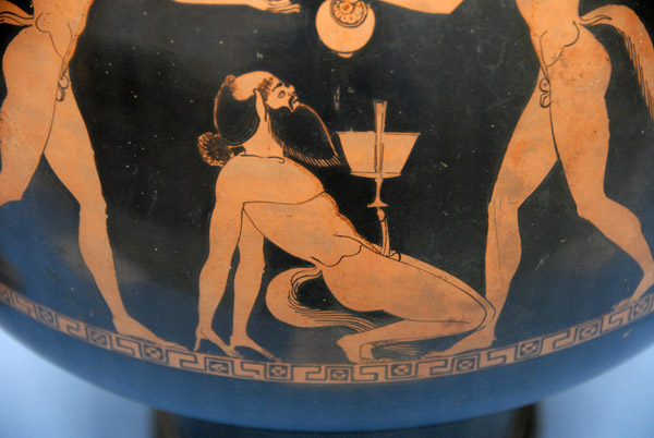 Wine cooler (psykter) with exhibitionist satyr; Athens ca 490 BC by Douris