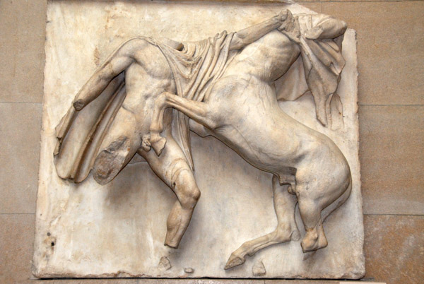 The Lapith lunges at the Centaur with his left hand while preparing to strike with his right, South Metope VII (heads in Athens)