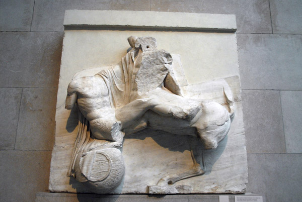 Lapith is rolled backward over a water-jar, Elgin Marbles, Parthenon South Metope IX (heads in Athens)
