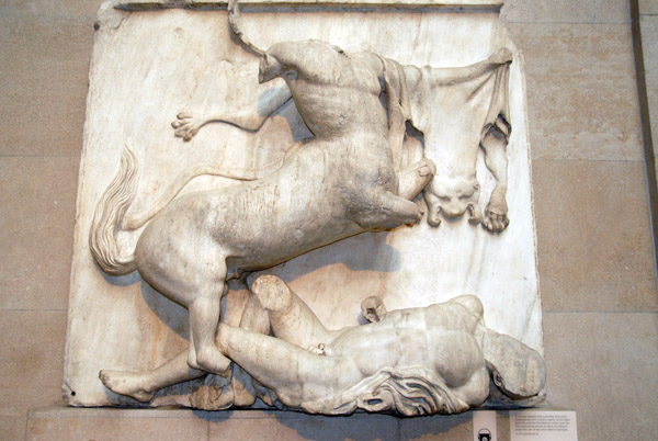 A Centaur draped with a panther skin rears triumphantly over a fall Lapith, Parthenon South Metope XXVIII