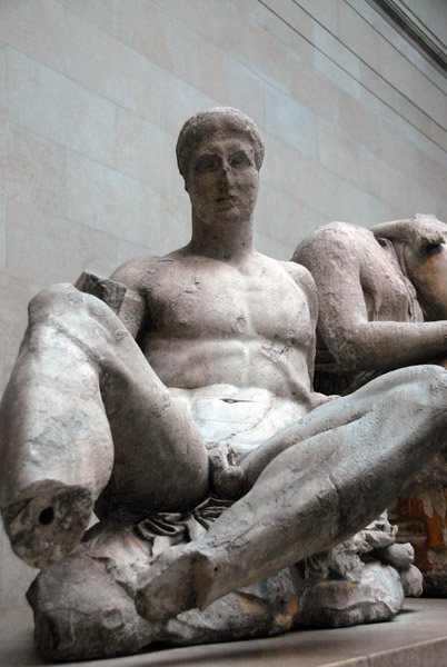 Naked youth reclines on a rock, probably Dionysos, god of wine, Parthenon East Pediment