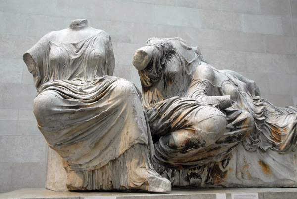 Seated woman on the point of rising thought to be Hestia, goddess of the hearth, Elgin Marbles, Parthenon East Pediment