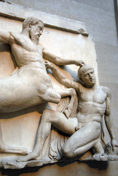 Centaur tramples a falling Lapith gripping his victim by the hair as he prepares to strike, Parthenon South Metope XXX