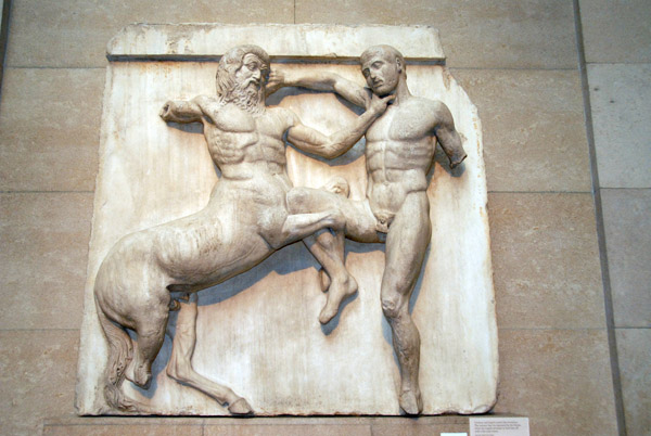 Centaur and Lapith tussle like wrestles with the Centaur at his oppoents throat, Elgin Marbles, Parthenon South Metope XXXI