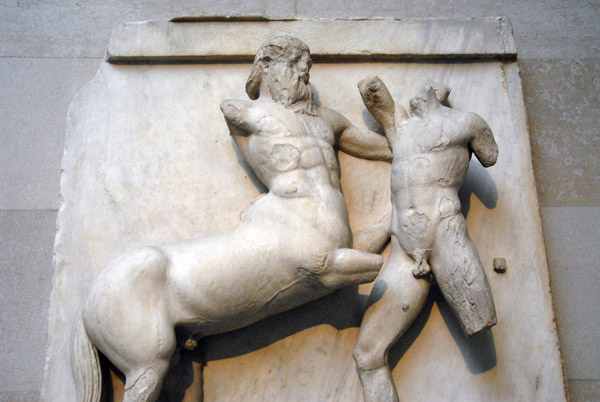 Centaur gripping the hair of the Lapith with his left hand while preparing to strike, Parthenon South Metope XXXII