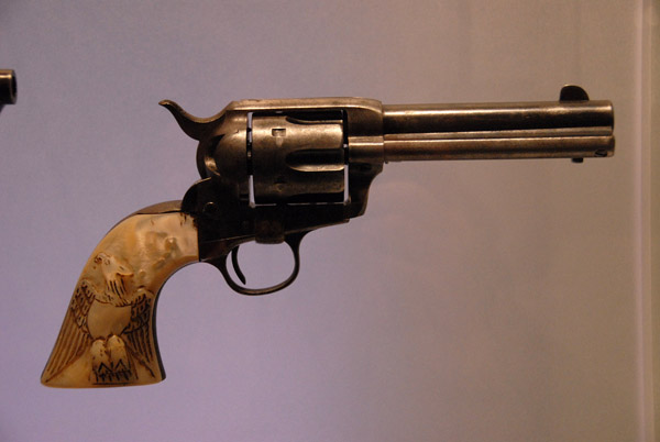 Revolver with a carved eagle handle
