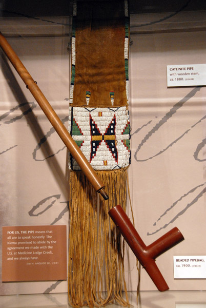 Catlinite Pipe with wooden stem, ca 1880, and beaded pipebag, ca1900