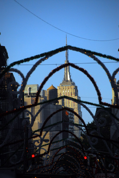 Empire State Building through the San Gennaro Feast decorations