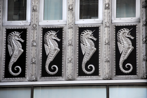 Four seahorses over the door to 80 Broad Street