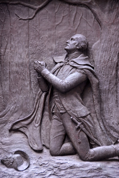 Bas Relief of George Washington on his knees, Federal hall