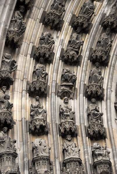 Small statues lining the arch above the north portal