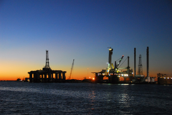 Oil platforms, Port of Galveston after sunset
