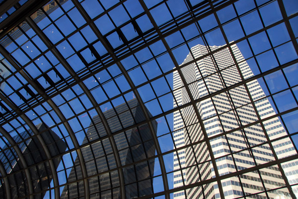 Fulbright Tower through the glass roof of Houston Center