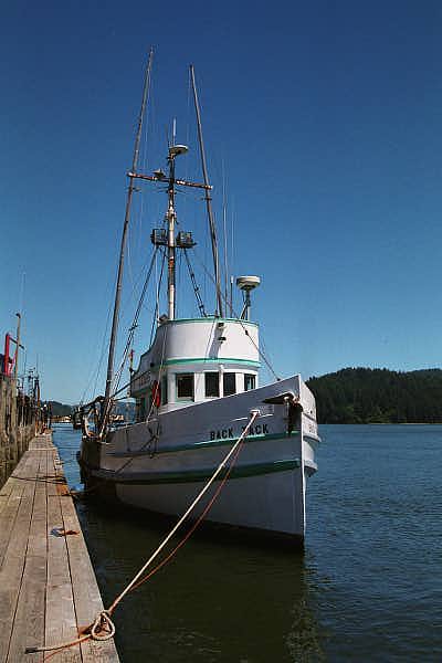 Fishing boat tied up alongside Florence, Oregon