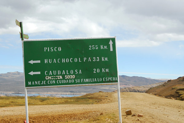 A rare roadsign at the junction of the road to Huachocolpa and Caudalosa