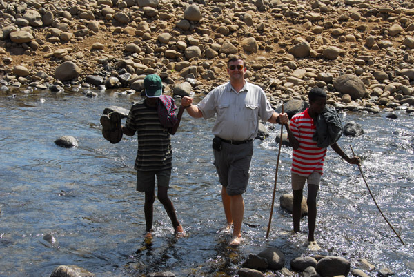 Keith getting lent a hand crossing