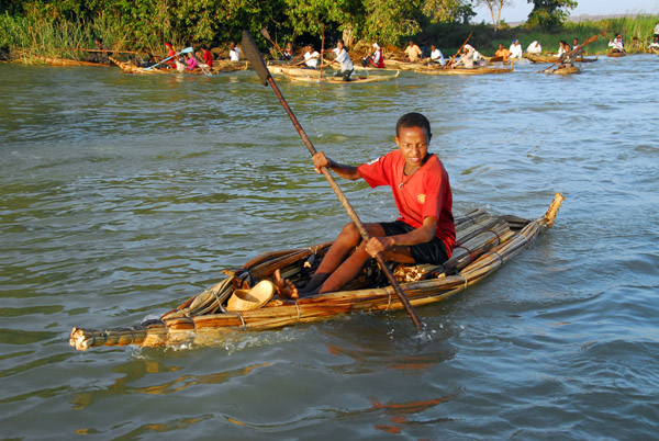 Boy padding a Tankwa (papyrus reed boat) Lake Tana