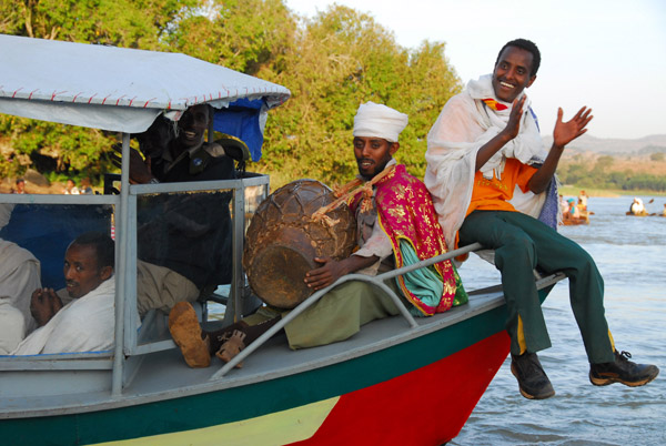 Drummer, Timkat procession on Lake Tana