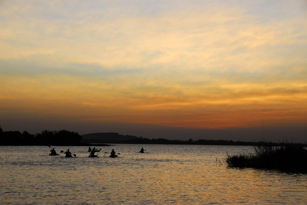 Kayakers paddling at the mouth of the Blue Nile, Lake Tana