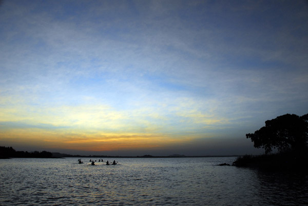 Paddlers at dusk, Lake Tana