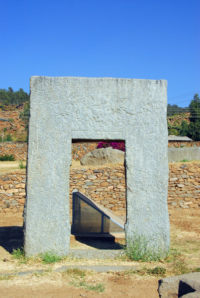 A doorway carved from a single piece of granite